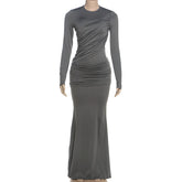 Vestido maxi ajustado a la cadera de color sólido transparente con cuello redondo y manga larga de otoño